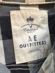 Snap button shirt tag