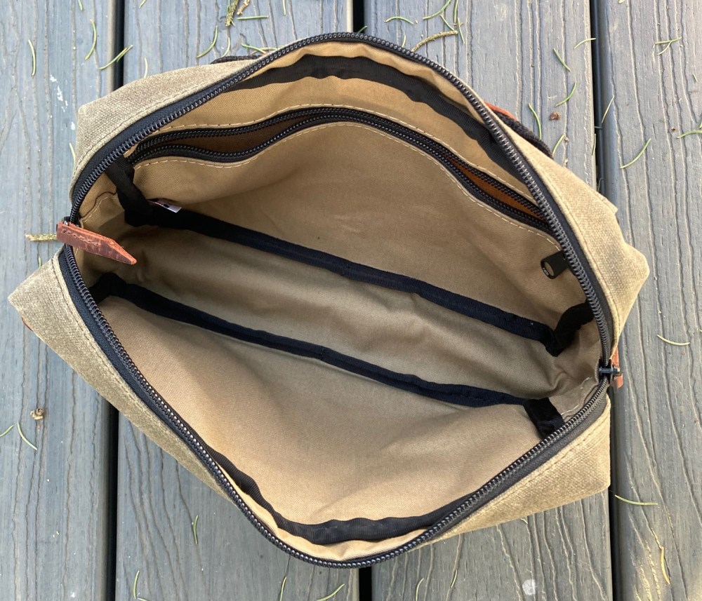 Inside the MBD. Plenty of space for your stuff and an inside zipper pocket to contain smaller items.